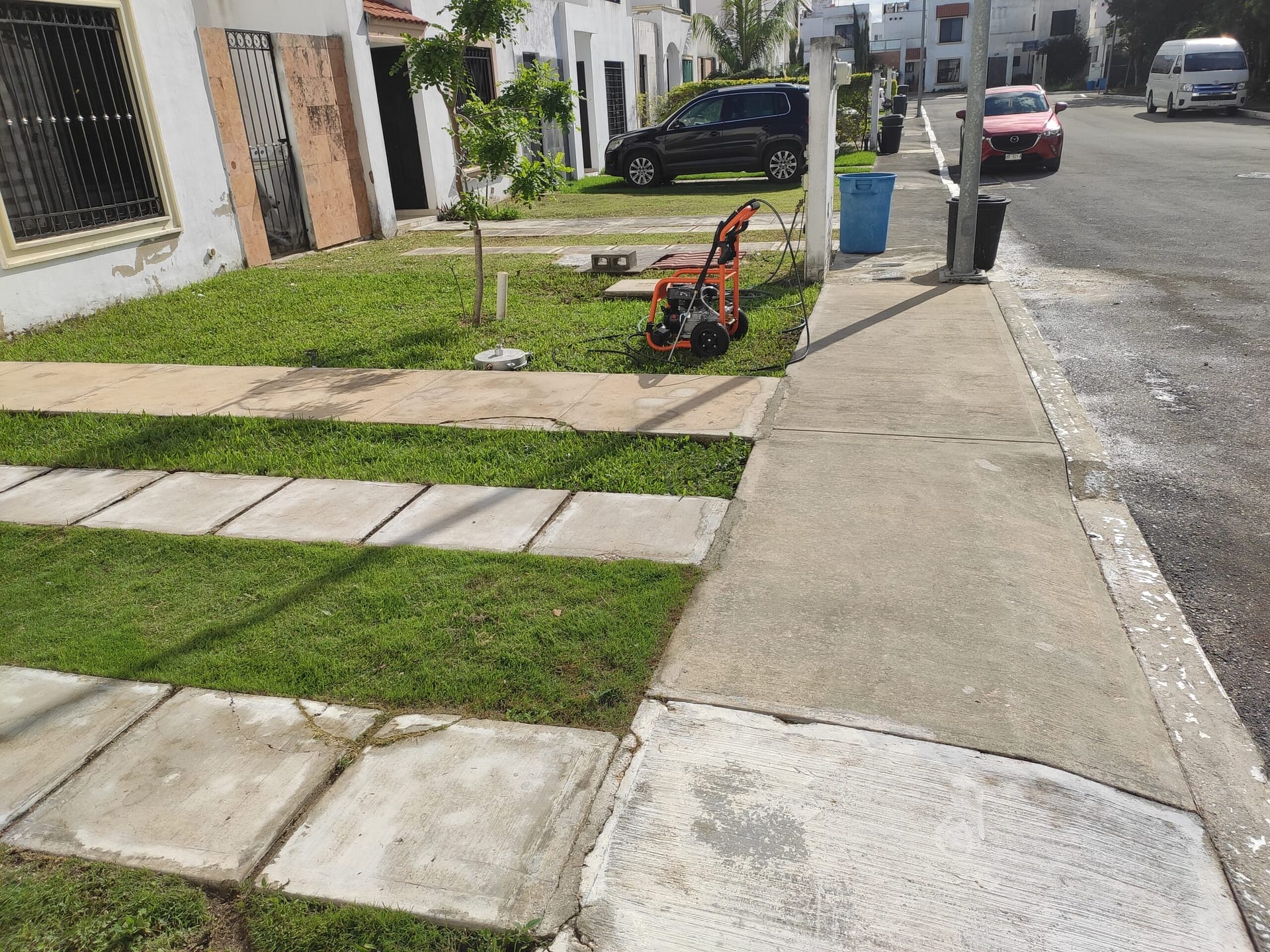 banqueta y pasillos limpios con lavado profundo